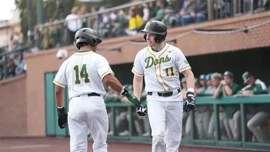 Tyler Harries celebrating with Jordan Lewis vs. Sac State