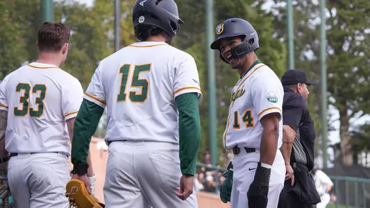 Jordan Lewis celebrating with Kenny DeCelle vs. Sac State