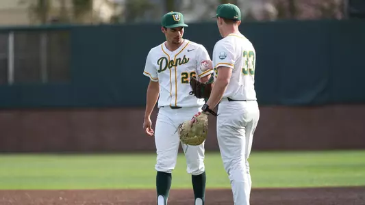 Joe Soberon getting the ball from Patrick Keighran