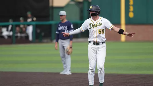 Trevor Harmon celebrating a hit vs. SMC