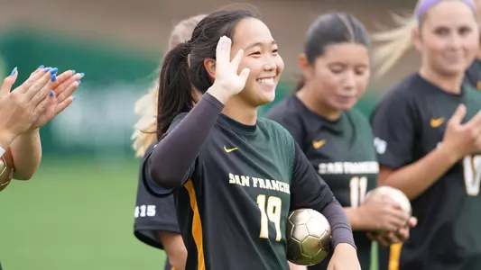 Sydni Yoshida Waving