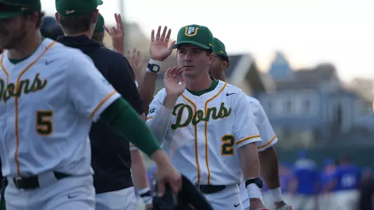 Myles Kallinger high fiving vs. WIU 2026