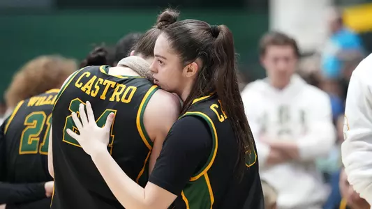 Aina Cargol hugging Sol Castro vs. LMU 2026