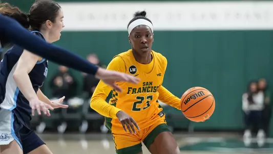 Candy Edokpaigbe dribbling vs. USD 2026