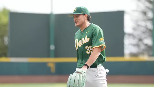 Kai Yovanovich walking to the dugout vs. CBU
