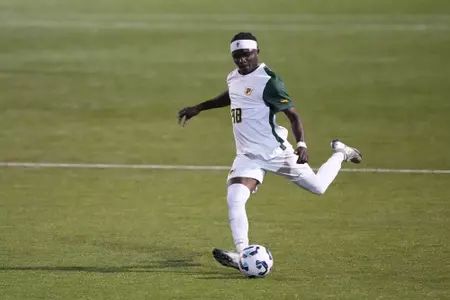 USF vs CSUB - David Raphael Kicking Soccer Ball