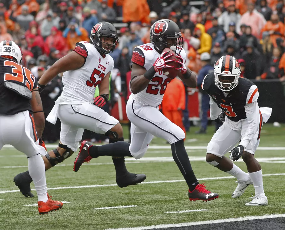 Utah running back Joe Williams hops into the end zone for a touchdown in the first half of an NCAA college football game against Oregon State, in Corvallis, Ore., on Saturday, Oct. 15, 2016. (AP Photo/Timothy J. Gonzalez)