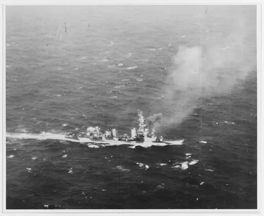 Firing her forward 8/55 guns while bombarding Iwo Jima, 23 January 1945. U.S.