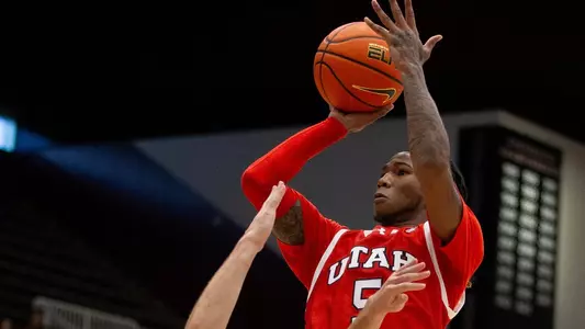Jan 14, 2024; Stanford, California, USA; Utah Utes guard Deivon Smith (5) shoots over Stanford Cardinal guard Benny Gealer (15) during the first half at Maples Pavilion. Mandatory Credit: D. Ross Cameron-USA TODAY Sports