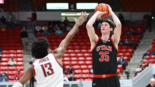 Jan 24, 2024; Pullman, Washington, USA; Utah Utes center Branden Carlson (35) shoots the ball against Washington State Cougars forward Isaac Jones (13) in the first half at Friel Court at Beasley Coliseum. Mandatory Credit: James Snook-USA TODAY Sports