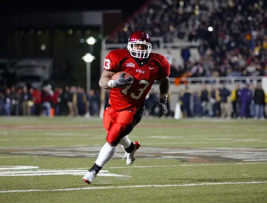 Before going onto an NFL playing career and returning home as Utah's running backs coach, Quinton Ganther (13) was the Utes' leading rusher in the 2004 matchup with BYU, taking 11 carries for 122 yards.
Utah led at halftime, 21-14, with Ganther gearing up for an incredible second half (he had just 38 yards in at the break).