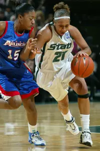 Meghan Nelson defends against Michigan State's Mia Johnson during the first half. (AP Photo)