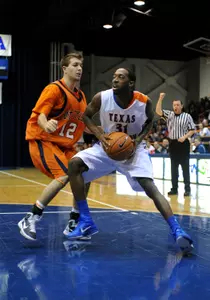 LaMarcus Reed drives for two of his 17 points.