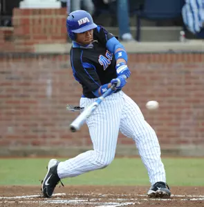 Michael Choice hits his first home run of the season in the first inning on Saturday