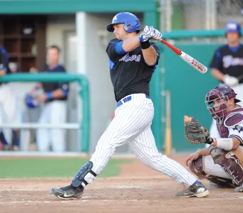 Chad Comer scored the game-winning runs in the seventh inning with a two-run single