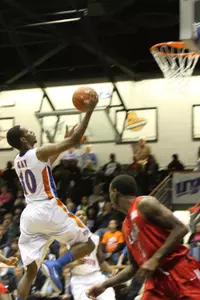 Bradley Gay drives for two of his 14 points Saturday.