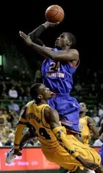 Kevin Butler drives to the basket against Baylor Wednesday night in Waco.