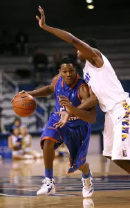 Cameron Catlett drives around a Tulsa defender in Saturday's game.
