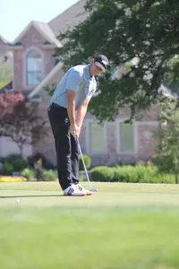 Cash Wilkerson putts for birdie on the seventh hole Tuesday.