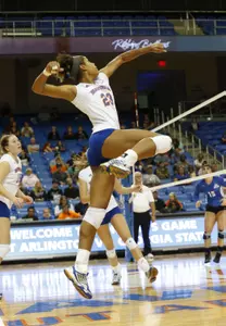 Charmaine Whitmore led with 13 kills and 10 block assists against Troy.