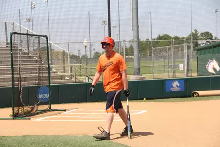 R.J. Choppy laughs after throwing the bat on a missed swing.
