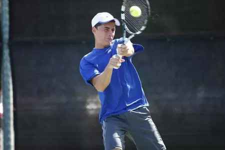 Freshman Francesco Migliano kept the Mavericks' hopes alive with a 6-4, 6-2 win.