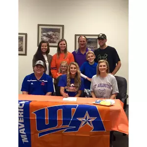 Briana Angel and family declaring her intent to play softball at UTA.