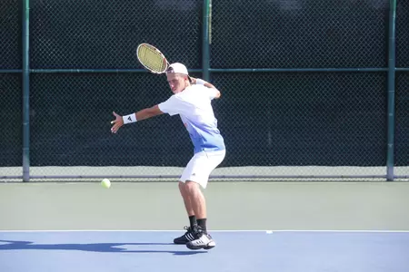 Carlos Arbiza led the men with a 11-4 singles record.