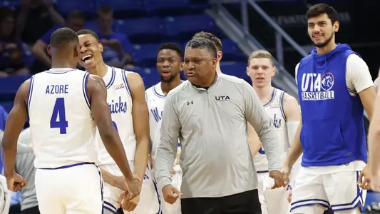 Men's Basketball Team Bench Reaction
