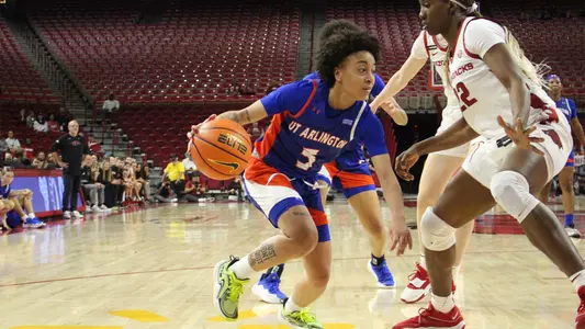 Nya Threatt Driving The Lane Past Arkansas Defender