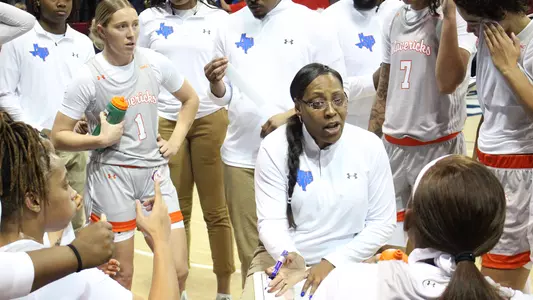 Coach Wright Drawing Up Play During Timeout