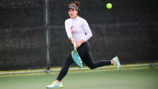 Ana Paula Jimenez Hitting Tennis Ball