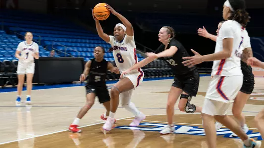 Koi Love Driving Past The Utah Tech Defender In The Lane
