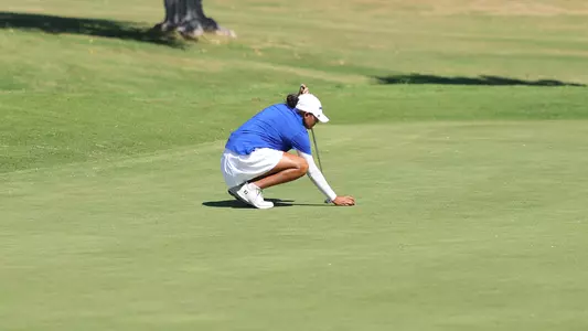 Tarini Lining Up Her Putt