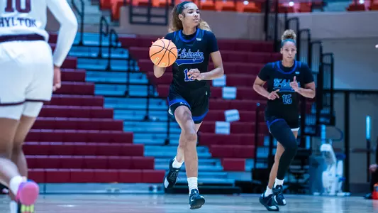 Kira Reynolds Dribbling Up The Court