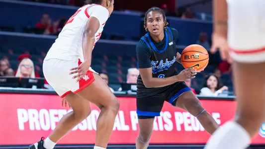 Erin Sellers Looks To Drive Past Houston Defender