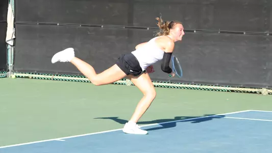Nika Novikova Follow Through On Her Serve
