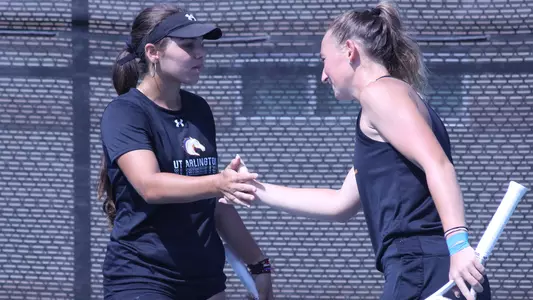 Lucia and Nika High Five at WAC Tourney