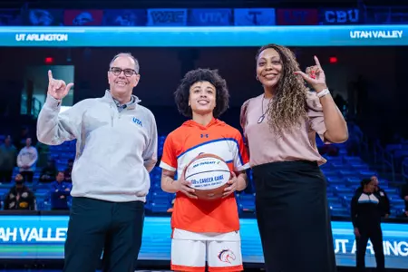 Nya being presented her 100th game ball