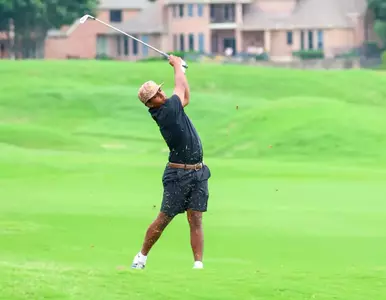 Sinha shoots an approach shot during WAC Tournament round three