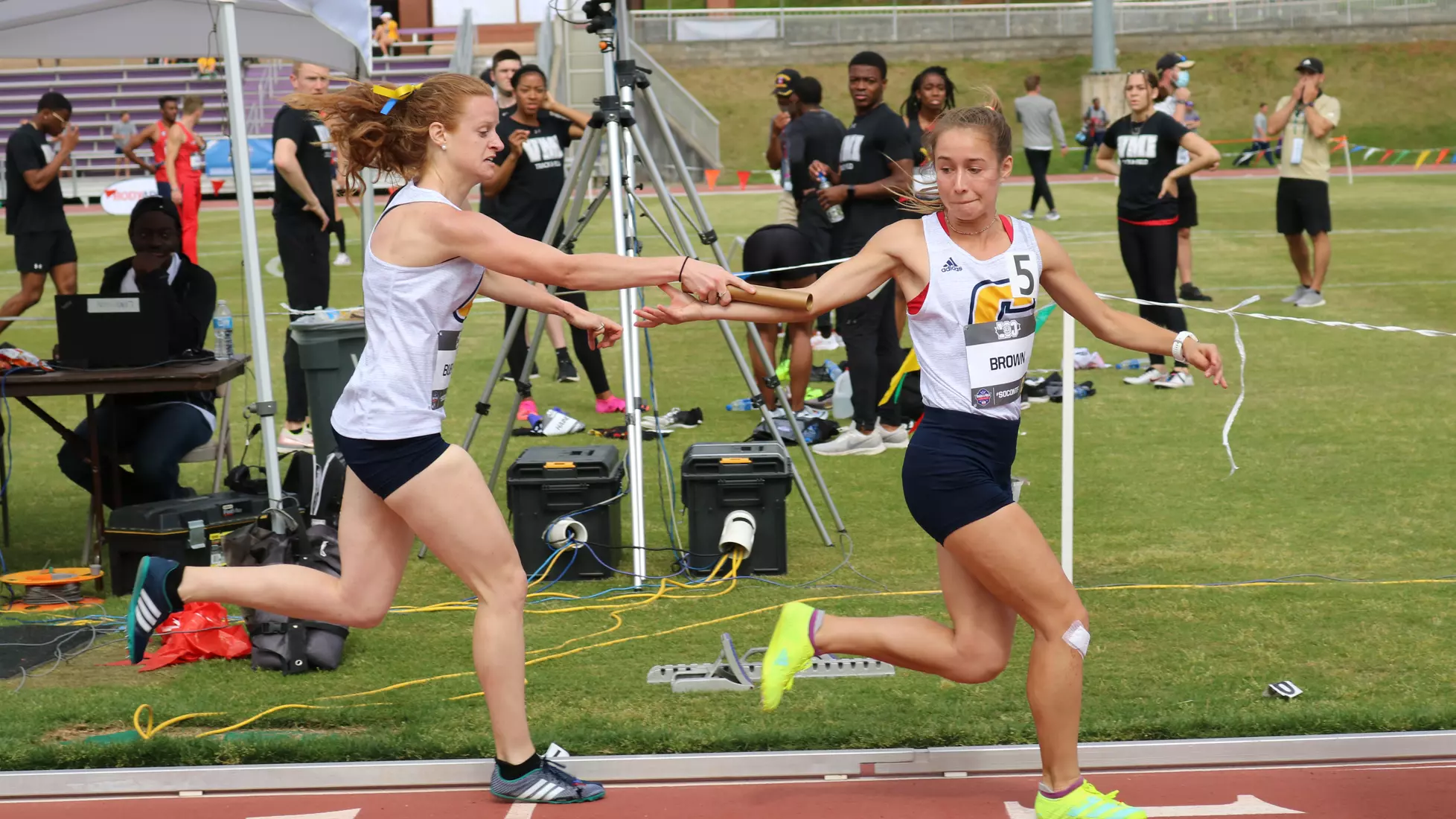Nicole Buehrle hands off to Faith Brown