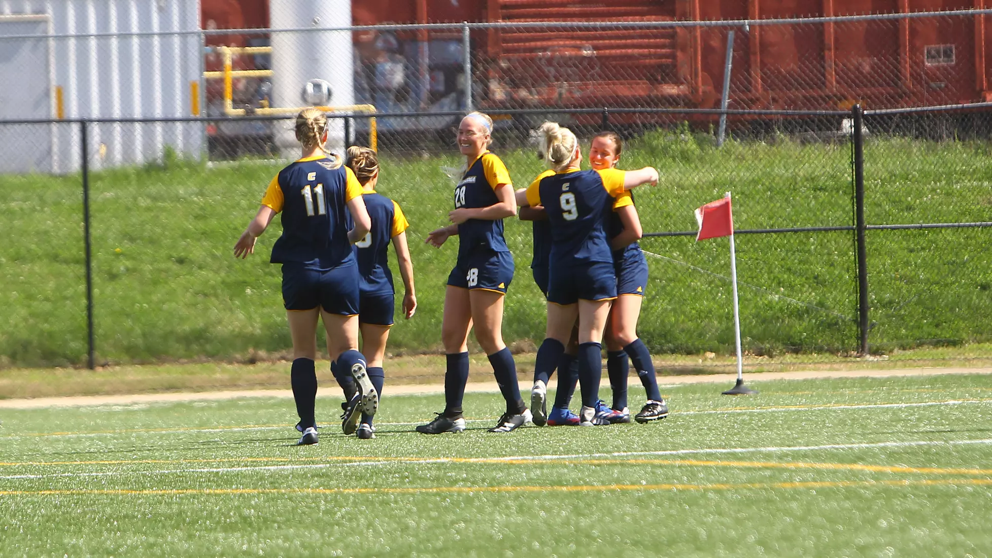 Team celebrates a goal.