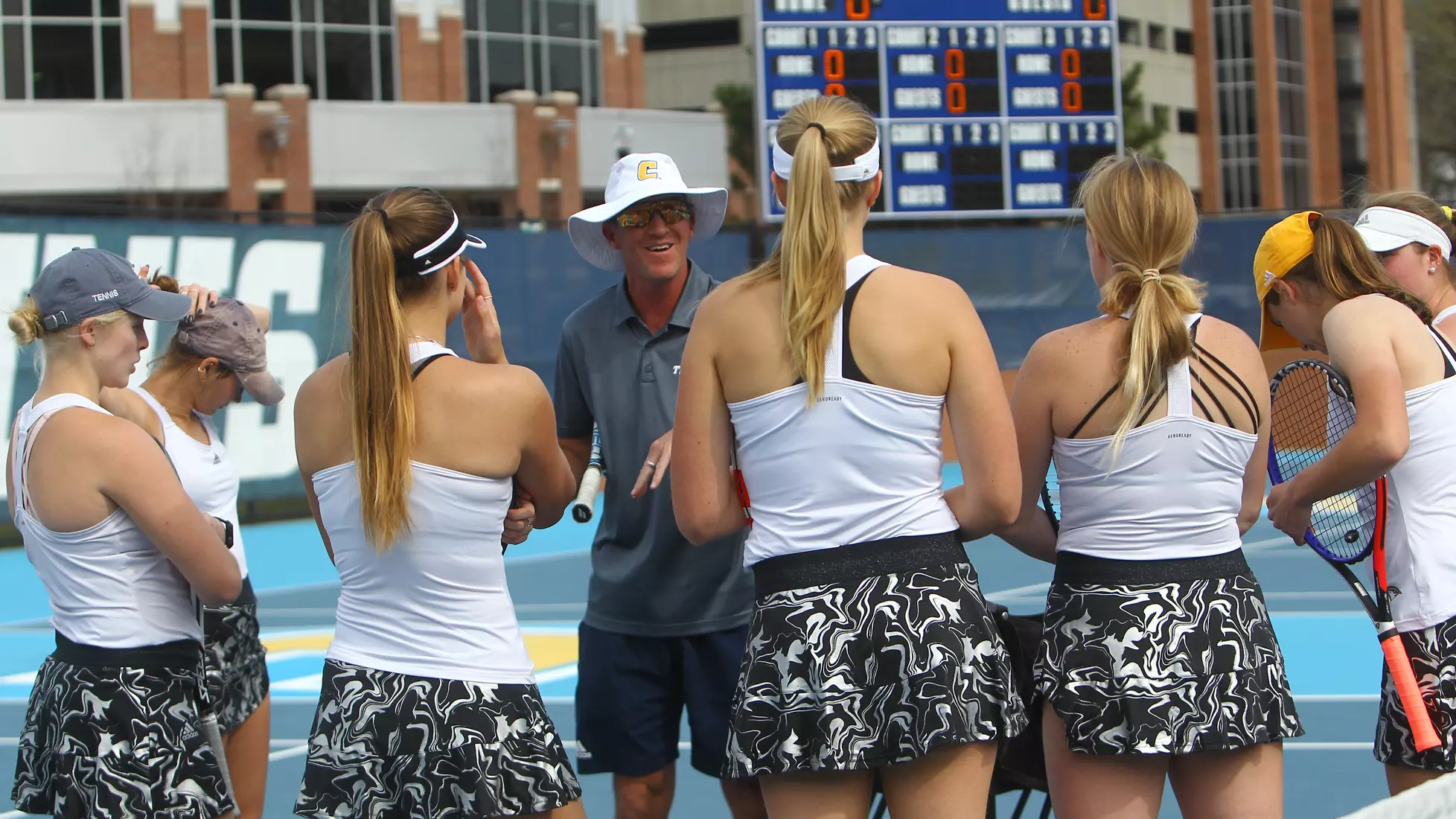 Head coach Chad Camper and the Mocs.