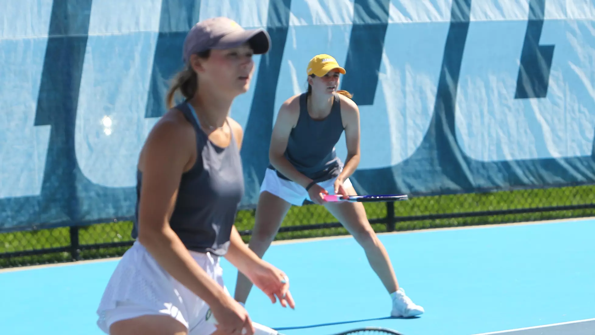 Caroline Gibbens & Emma Van Hee.
