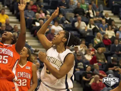 Hollinquest's Free Throws Sink Bucs, 70-69