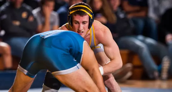Mocs Win Navy Classic