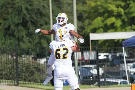 C.J. Board and Corey Levin celebrate a score.