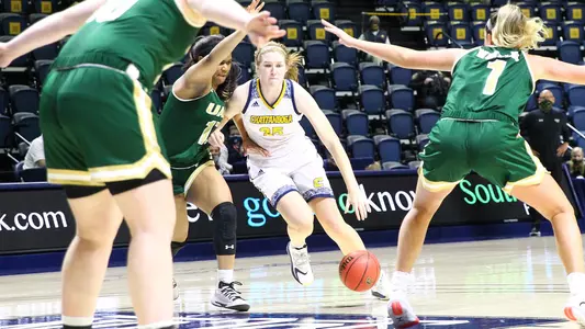 Abbey Cornelius drives to the bucket.