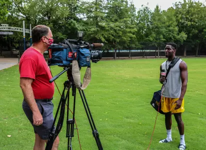 Jerrell Lawson being interviewed by TV