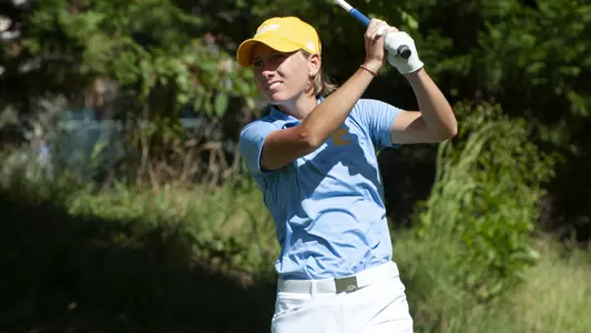 Dorota Zalewska poses with a wee smile watching another strong drive.